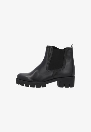 Black leather Chelsea boots with elastic side panels, rounded toe, and chunky rubber sole featuring a textured grip pattern.