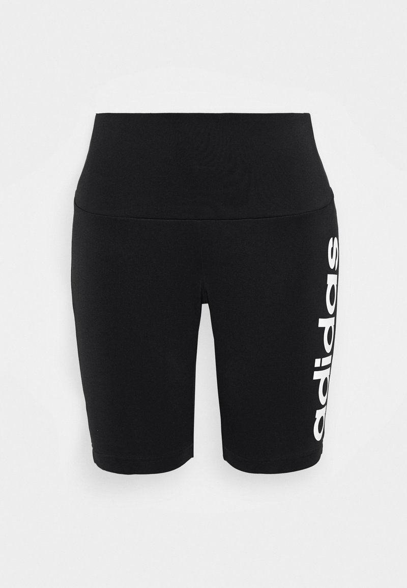 Shorts de sport noirs taille haute avec "adidas" imprimé verticalement en blanc sur la jambe gauche, sur fond uni.