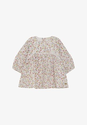 Blommig klänning i lätt material; vit bakgrund med rosa, gula och gröna blommor; långa ärmar och rynkad midja för volym.