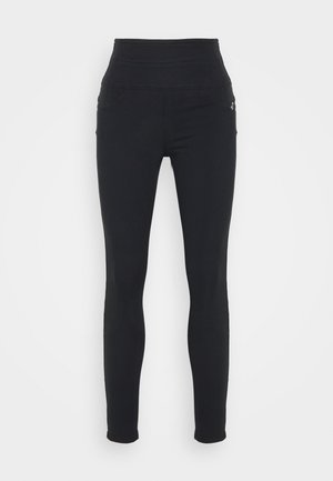 Black high-waisted leggings with a smooth texture, two side pockets, and a fitted design, suitable for casual or active wear.