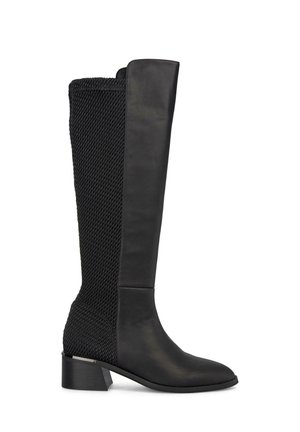Bottes montantes noires pour femmes, à talon bloc bas, avec un panneau arrière en tricot texturé contrastant avec l'avant en cuir lisse.