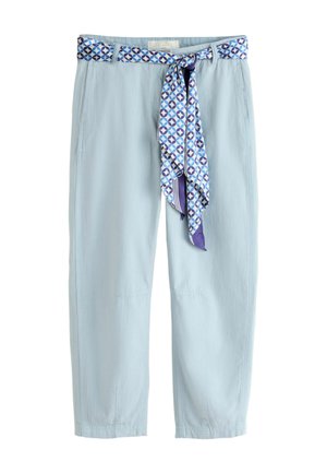 Light blue women's pants with a high waist, paired with a blue patterned fabric belt tied in a bow.