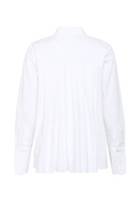 White long-sleeve shirt with a pleated back, buttoned cuffs, and collar, made from a smooth fabric. Clean, simple design and finish.