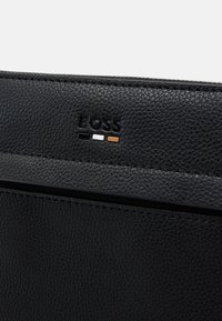 BOSS RAY ZIP UNISEX - Cross body bag - black