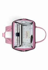 Black and pink tote with a zippered opening, lined interior featuring blue diagonal stripes, accommodating a laptop, notebooks, and a pen.