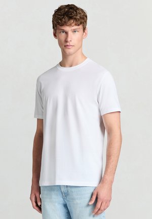 UNITA - T-shirt basique - bianco ottico