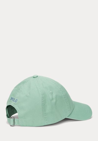 Light green cotton baseball cap with a curved brim, adjustable strap, and embroidered "POLO" logo in blue on the side.