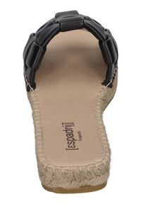 Black woven leather slide sandal with a natural jute sole, featuring a padded strap and beige footbed detailing, suitable for casual wear.