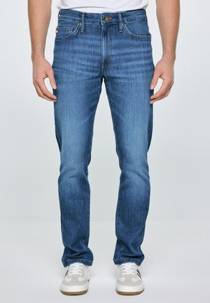 Kitsenevad teksad - marine