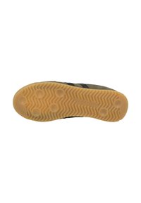 Kumise itse, jossa on herringbone-kuviointi ja pyöreät tartuntapinnat. Väri on beige, ja yläosa on ruskeanvihreä mustilla yksityiskohdilla.