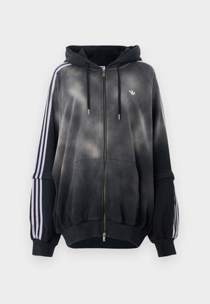 Black hoodie with a gradient effect, made from soft material. Features zipper closure, large front pockets, and white side stripes.