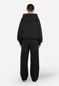 Pegador CLARITA OVERSIZED  - Felpa con zip - washed black/white