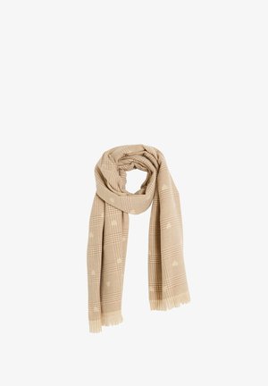 Bufanda beige con un patrón de cuadros y sutiles formas de corazón, con bordes con flecos y una textura suave, adecuada para superponer.