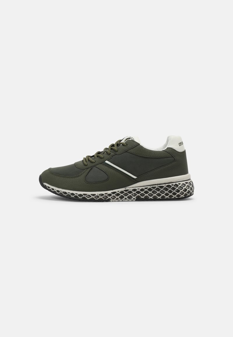 Olive green athletic shoe with a textured leather upper, white accents, and a patterned black and white sole. Features laces and a curved design.