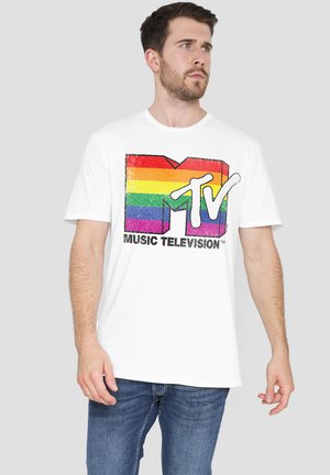 White cotton t-shirt featuring a multicolored rainbow MTV logo with textured accents. The logo is centered, set against a plain background.