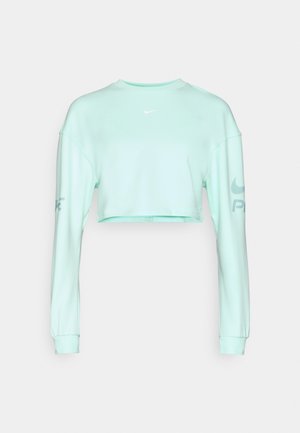 Sweatshirt court vert menthe à manches longues, avec un col rond et un petit logo Nike blanc sur la poitrine et le bras.