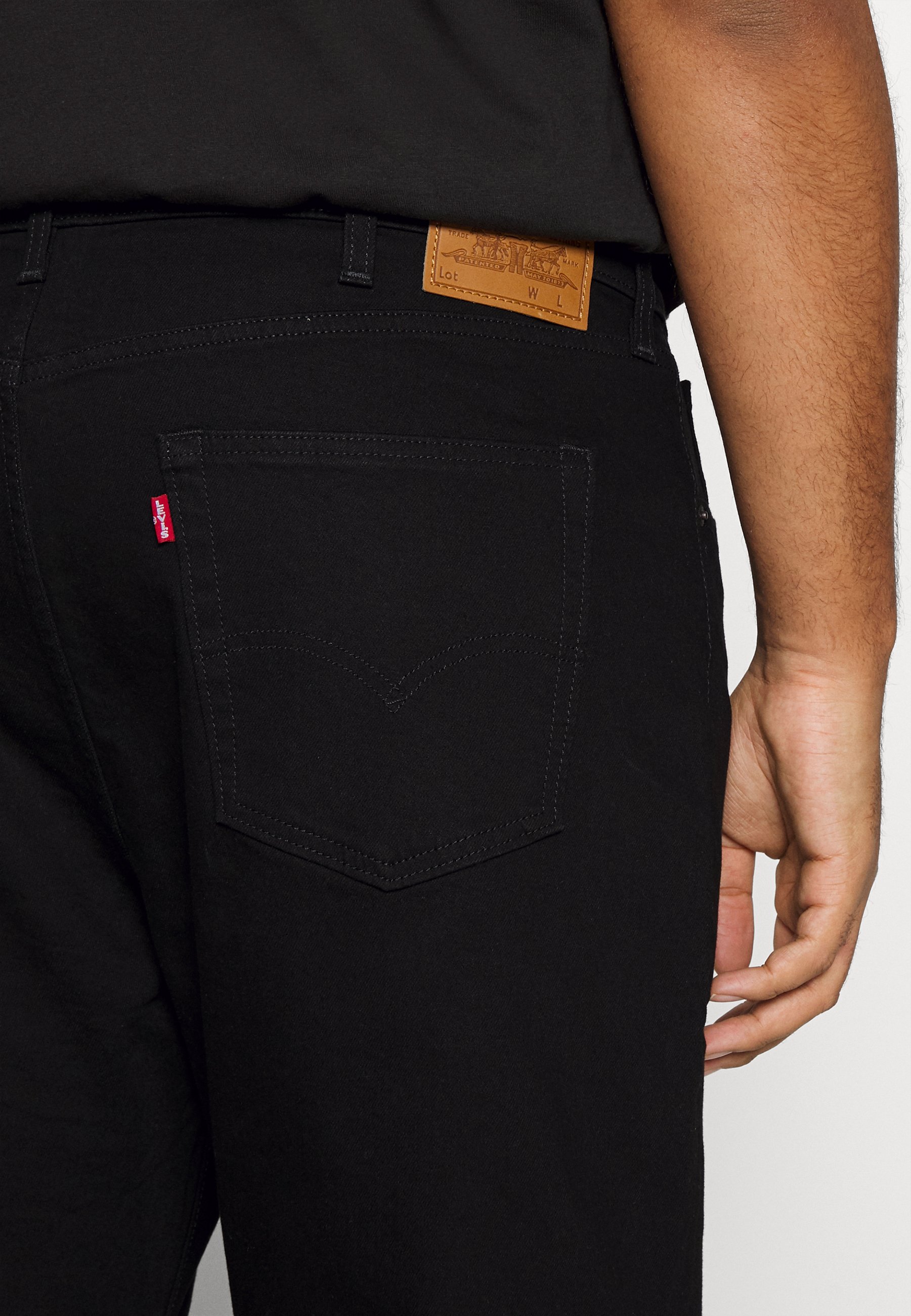 Levi's® Plus SKINNY TAPER - Jeans Tapered Fit - black leaf/nero denim -  Zalando