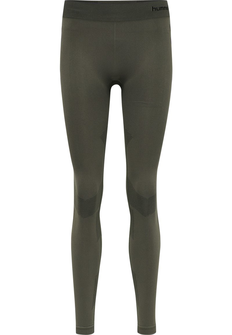 Groene rekbare leggings met een hoge tailleband, voorzien van textuurdetails langs de zijkanten en geometrische patronen in donkere tinten.