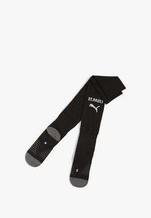 Calcetines deportivos negros con talón y puntera grises, con el texto "ST. PAULI" y el logo de Puma en blanco. Incluye marcas para pie izquierdo y derecho.