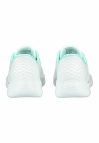 White athletic shoes with a textured, quilted pattern on the sides and mint green accents on the heel and collar. Lightweight design.