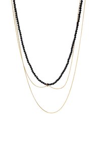 Three-layer necklace featuring black beaded strands and two gold chains, with varying lengths and textures, secured with a connecting ring.
