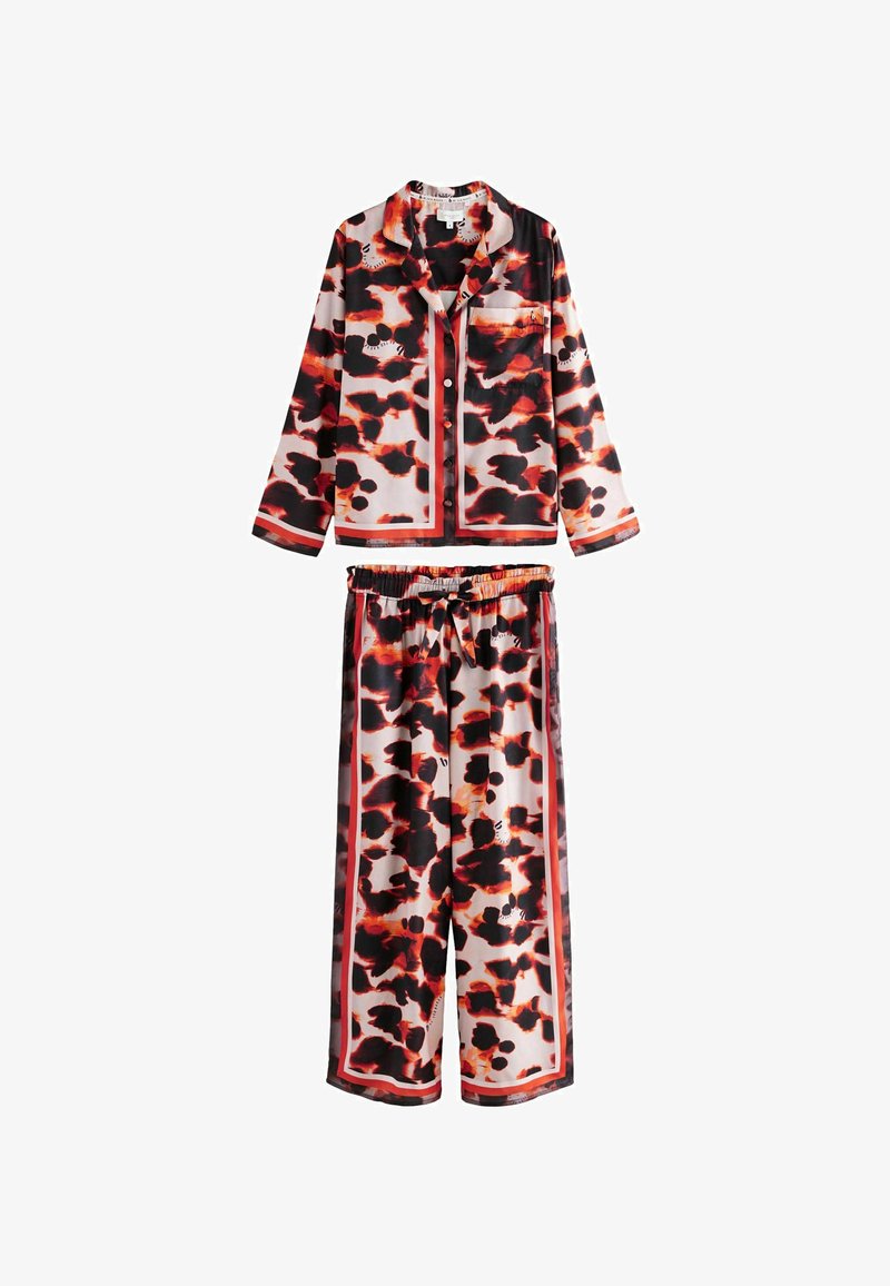 Geprinte pyjama set in zwart, rood en wit, met een knoopsluiting lange mouwen shirt en elastische taillebroek met een gedurfd abstract patroon.