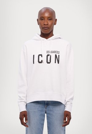 White hoodie made of soft fabric, featuring a front graphic "ICON" in black, with an adjustable drawstring hood and ribbed cuffs.