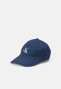 Navy baseball cap made of cotton, featuring a curved visor and front embroidered logo in white. Lightweight design with six-panel construction.