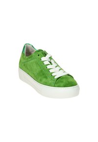 Green suede sneaker with white laces, rounded toe, and textured sole. Features a smooth interior lining and a contrasting heel tab.