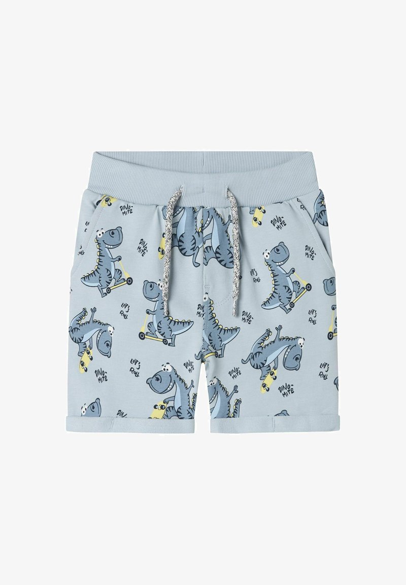Šviesiai mėlynos vaikiškos šortai iš medvilnės, su dinozaurų spauda, elastingu juosmeniu su raišteliu ir apdailintais kraštais.