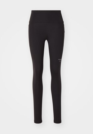 Black leggings made of stretchy material, featuring a high waistband, side pockets, and a printed logo on the lower leg.