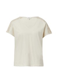 T-shirt col en V de couleur crème clair, avec des accents en crochet sur les épaules et les manches courtes, fabriqué en tissu doux et léger.