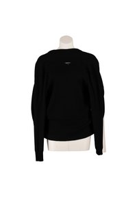Pull noir à manches longues présenté sur un mannequin, vu de dos, avec une petite étiquette près de l'encolure.