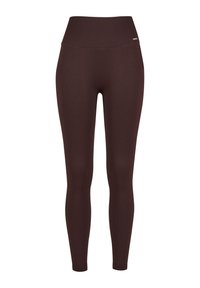 Prunamudilised legginsid, millel on kõrge vöökoht, istuv siluett ja sujuv tekstuur. Lihtne disain, ilma nähtavate detailide või aktsentideta.