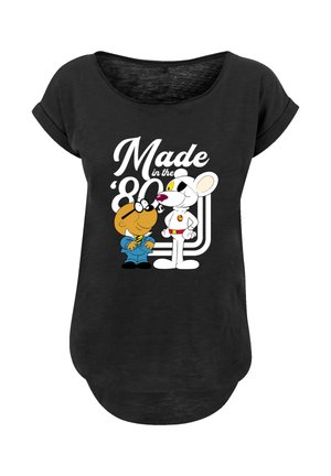 Schwarzes T-Shirt mit einem Cartoon-Design von zwei Charakteren und dem Text "Made in the '80s". Weicher Stoff, lockere Passform, abgerundeter Saum.