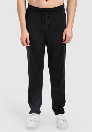 NAIRO MODAL BASICS - Tracksuit bottoms - schwarz