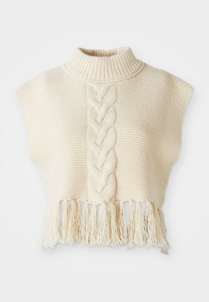 Ivory gebreide trui met een hoge kraag, voorzien van een centraal gevlochten patroon en een franjeszoom. Korte, cape-stijl mouwen, textuurstof.