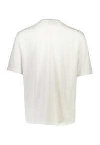Camiseta de algodón de manga corta blanca, con cuello redondo y un corte relajado. Textura suave sin patrones o acentos visibles.