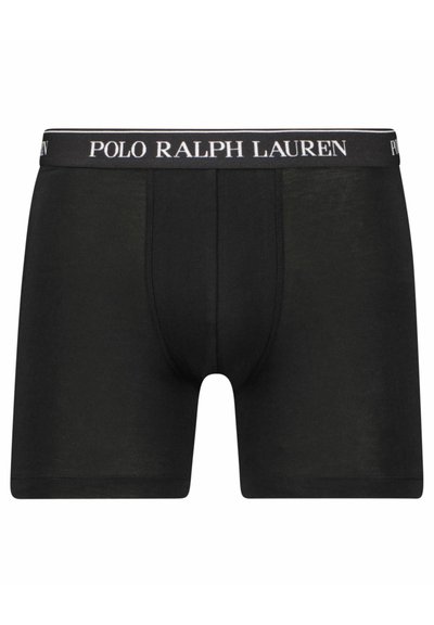 Boxeri din bumbac negru, cu un brâu elastic care prezintă textul "POLO RALPH LAUREN" în alb. Textură netedă, design de lungime medie.