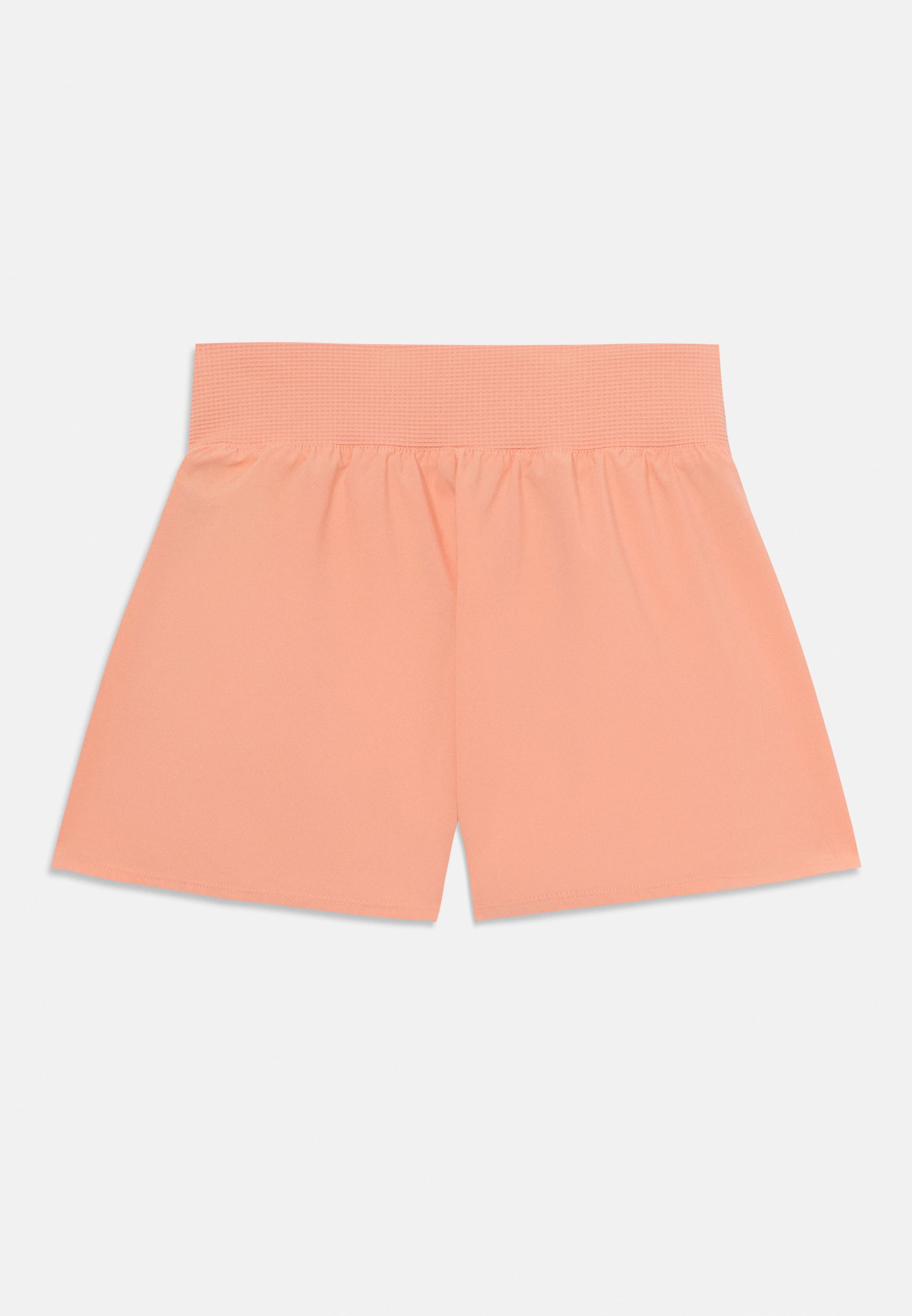 peach colored nike shorts