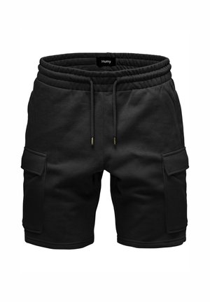 Black cargo shorts with elastic waistband, drawstring, and large side flap pockets, front view on a white background.