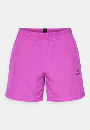 Purple Nike Pro athletic shorts with an elastic waistband. Features side pockets and a small black logo on the left. Smooth texture.