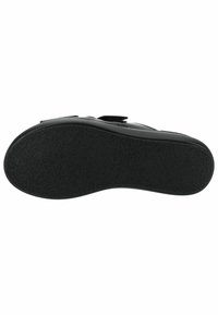 Suola di scarpa nera realizzata in gomma texturizzata con un bordo liscio. Ha una forma arrotondata senza motivi o accenti visibili.