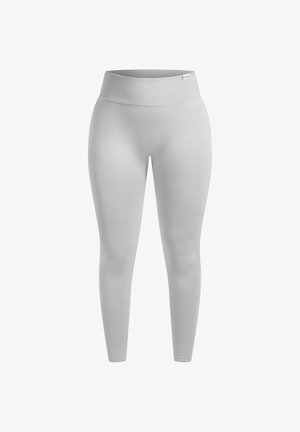 Helle graue Leggings mit einem hohen, gerippten Bund. Glattes, elastisches Material mit slim fit, das sich an den Knöcheln verjüngt. Keine sichtbaren Nähte oder Muster.