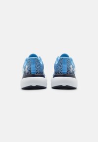 Blue athletic shoes with a textured mesh upper, featuring a white midsole and a dark blue outsole. Back view shows dual-layer construction.