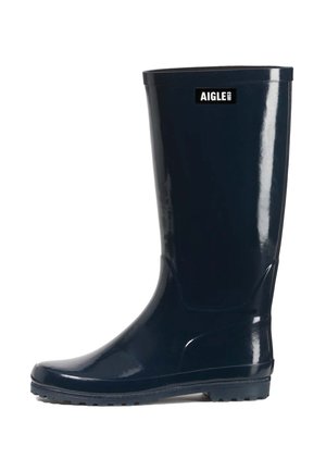 Botte de pluie en caoutchouc noir brillant avec semelle crantée et logo "Aigle 1853" près du haut, vue de côté sur fond blanc.
