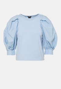 Top corto de manga corta en azul claro con mangas abullonadas y puños ajustados. Material de algodón suave, cuello redondo y corte relajado.