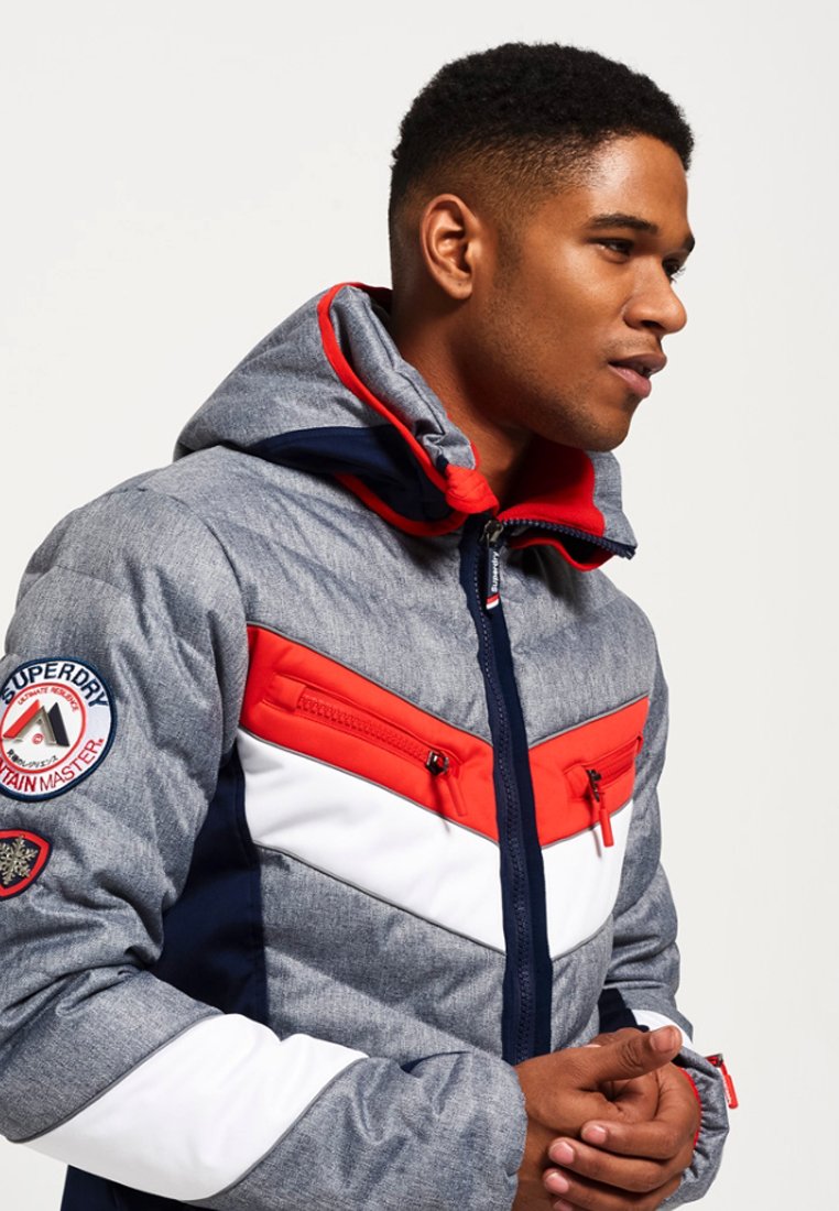 Superdry SCUBA SLOPESTYLE FUJI JAS MET CAPUCHON Ski jas Superdry SCUBA SLOPESTYLE FUJI JAS MET CAPUCHON Ski jas