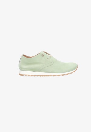Light green suede casual shoe with white sole, beige laces, and textured tan outsole, shown in side profile on white background.