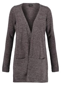 Grå stickad cardigan med långa ärmar, V-ringning och två framfickor. Har en mjuk textur och en avslappnad silhuett.